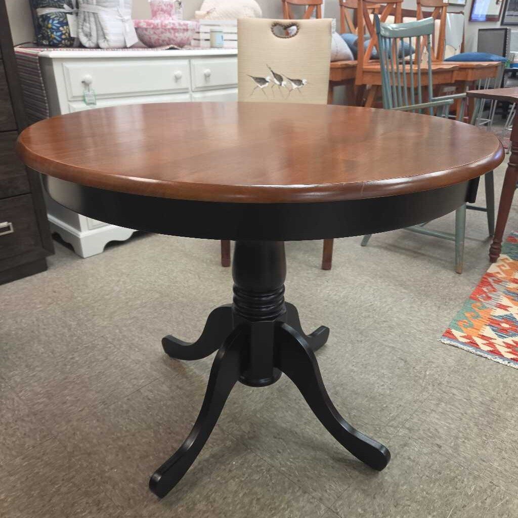 Round Cocktail Table with Pedestal Base - Black and Cherry Finish